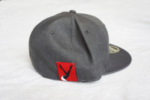 Dark Grey Hat Red Legs in the Air Patch